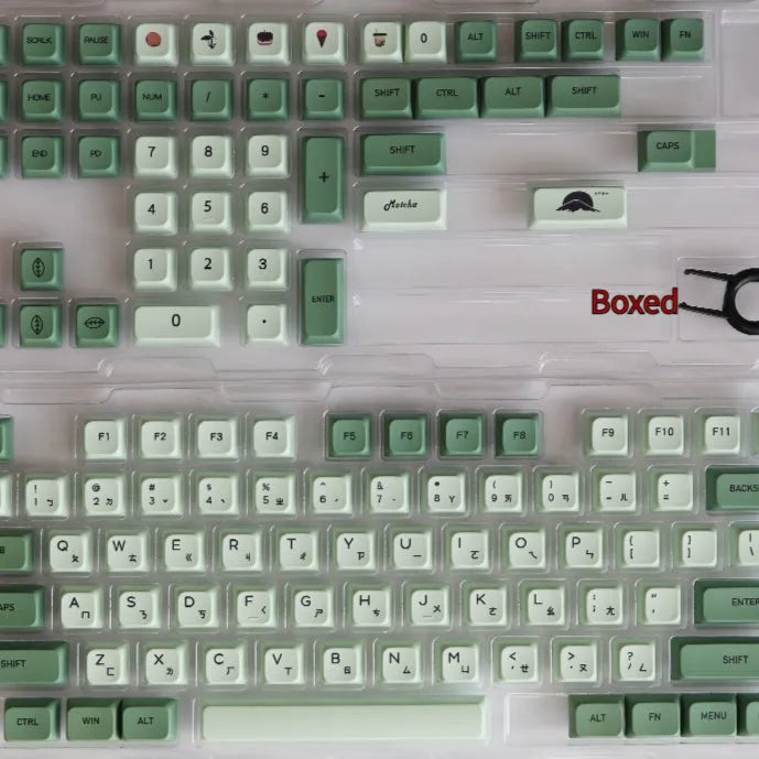 Full set of 124 matcha green PBT keycaps for a mechanical keyboard, showing various international layout options.