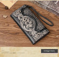 Women's brown tri-fold leather wallet with embossed floral pattern, shown open to reveal compartments.