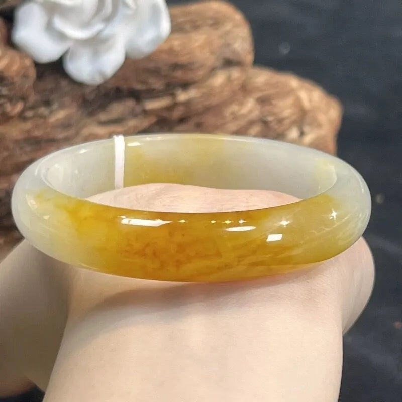 Geometric carved natural topaz bracelet with 12mm beads on white background