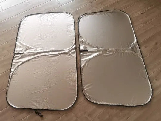 Titanium silver aluminium foil car sunshade folded to show size and reflective surface