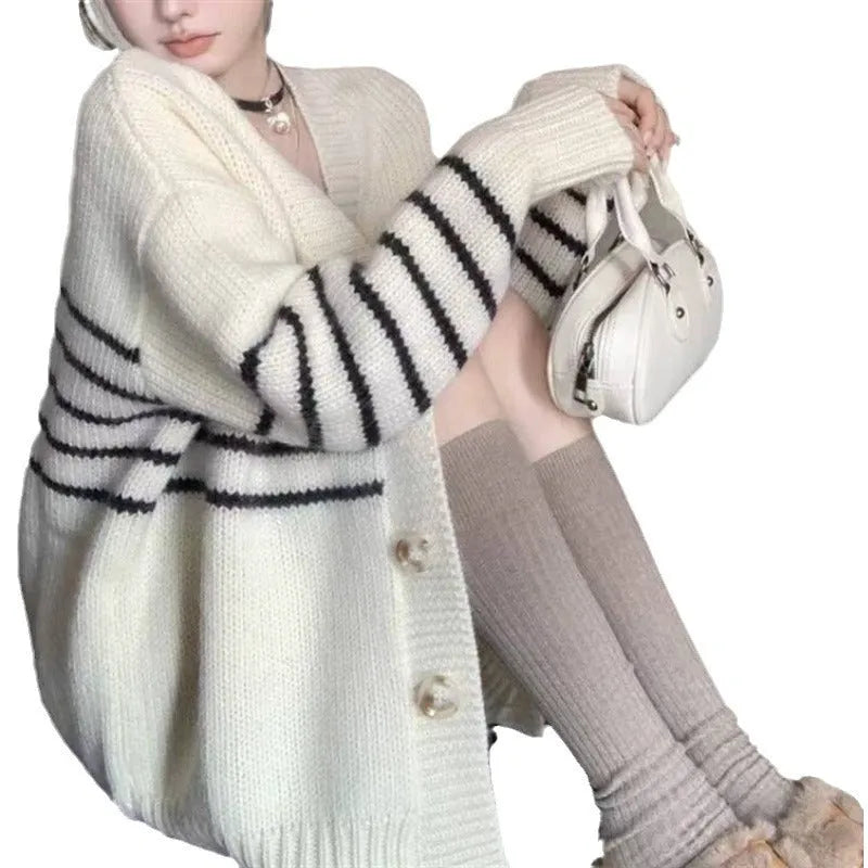 Women's button-down cardigan sweater with a 3D texture pattern in a casual style.