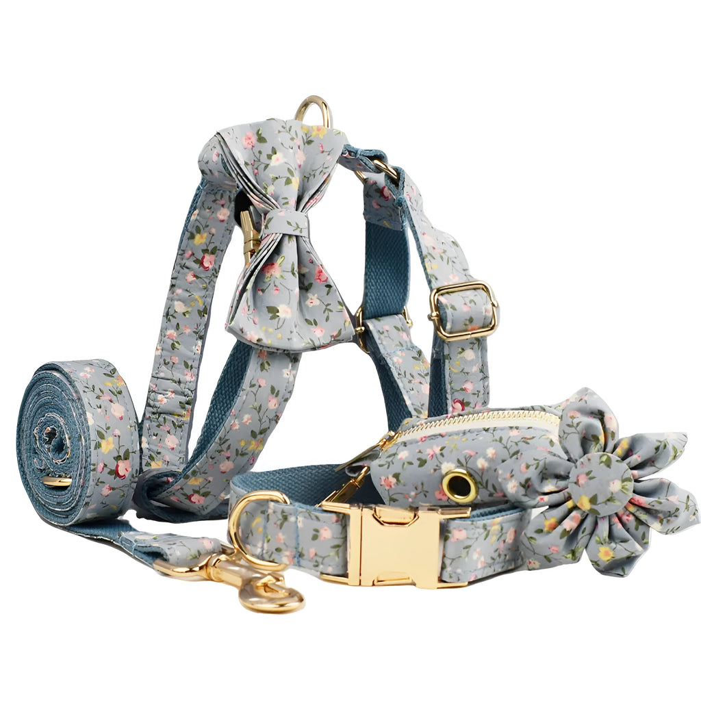 Blue floral polyester cotton dog collar set with leash, bow, vest and poop bag accessories