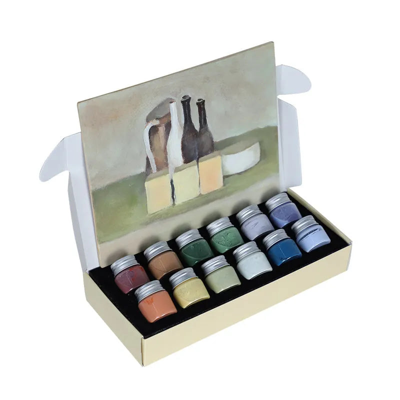 Three pots of Morandi colour ceramic glaze paint in lilac, plant ash, and verdant for high-temperature pottery.