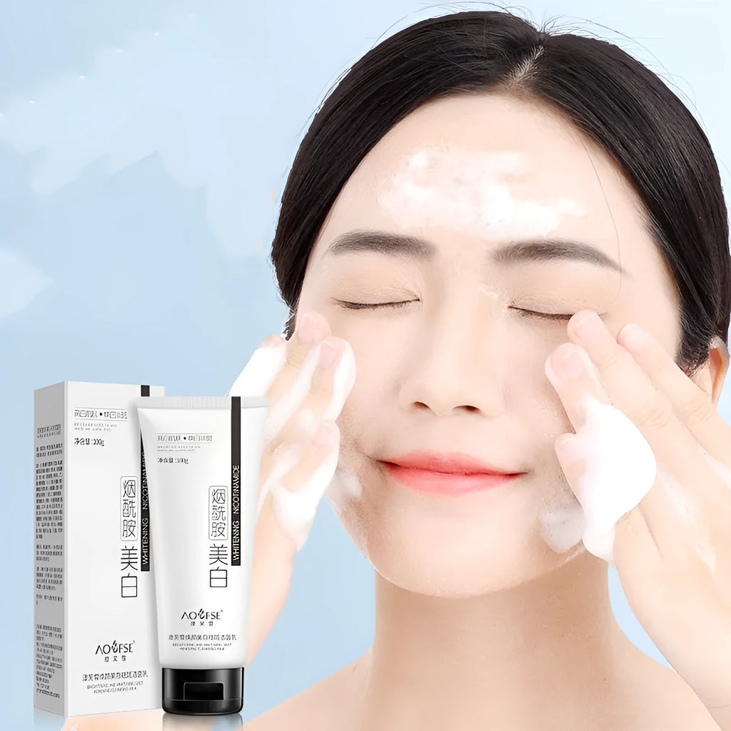 White bottle of whitening and freckle removing facial cleanser, 100ml.