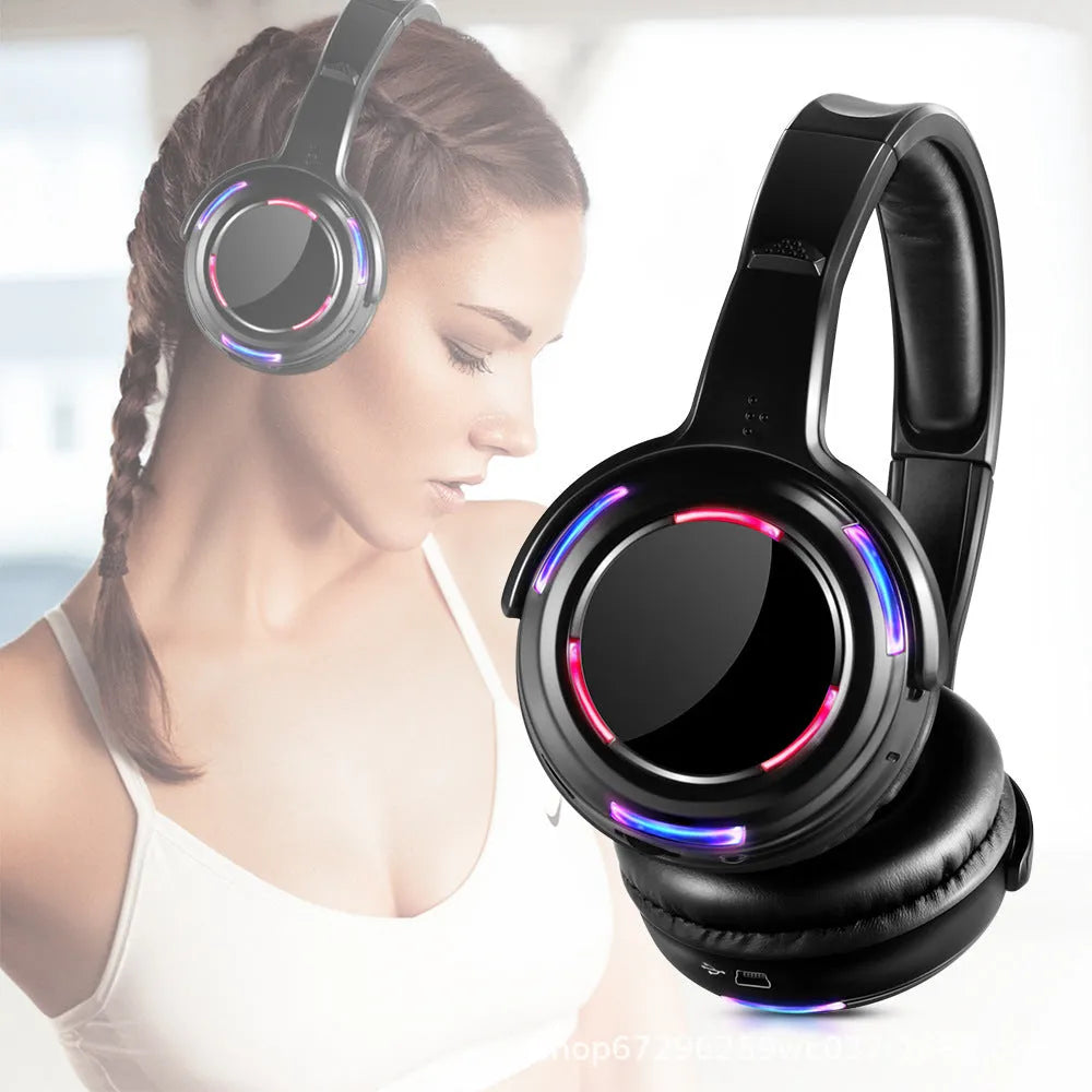 Black silent disco wireless headphones with head-mounted design and 3.5mm plug for transmitter connection