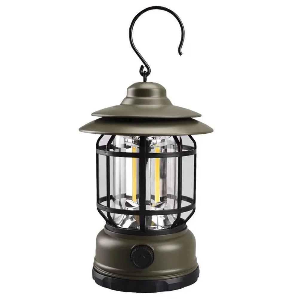Dark green portable camping head lamp lantern with dimensions 16.6cm by 6.7cm by 9.6cm