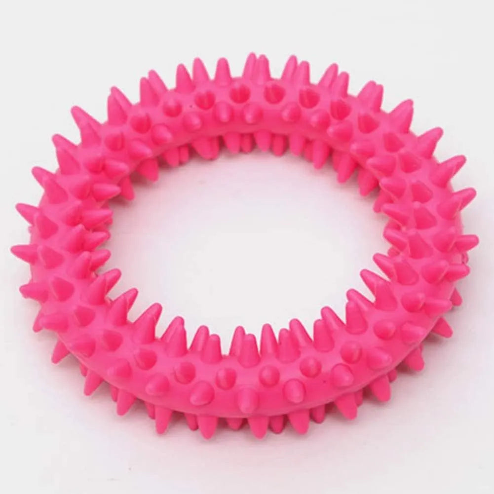 Blue TPR spiky circle dog chew toy on a white background showing dental nubs and ring shape.