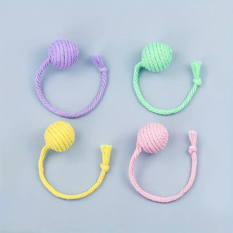 Green cat toy ball with rope and bell for kittens in 6cm and 3cm sizes