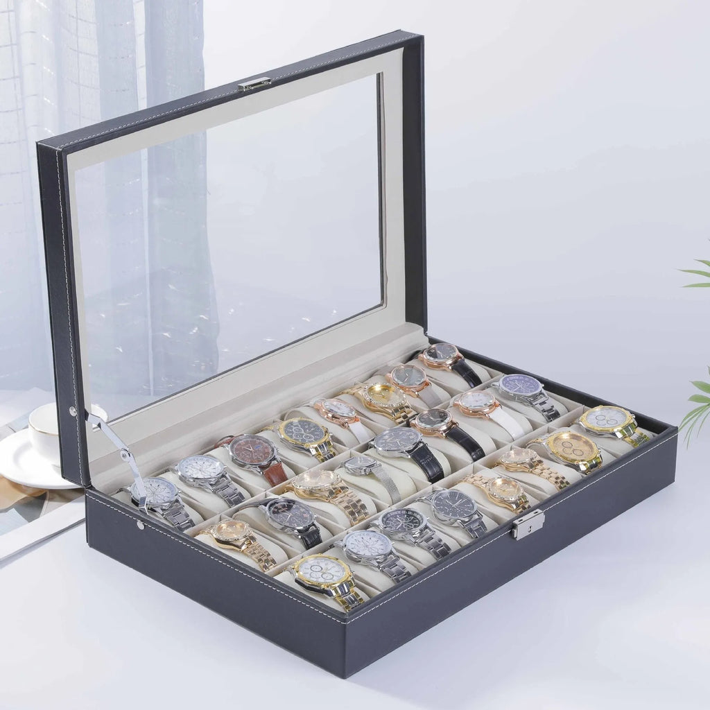 Grey high-grade leather watch storage box with a transparent see-through lid on a wooden surface.