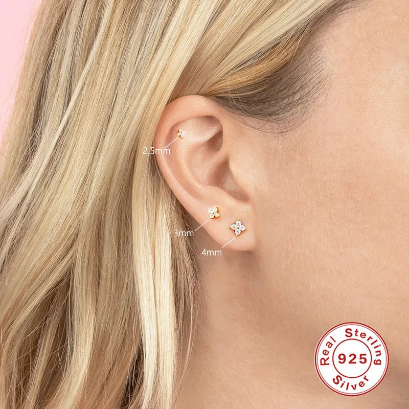 S925 sterling silver geometric flower stud earrings with crystal petals in gold or platinum finish.