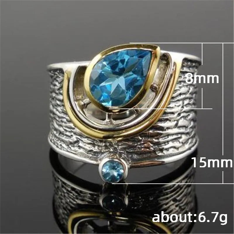 Blue Chinese style zircon ring with rhinestone detailing and drop shape on alloy band