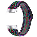 Printed elastic watch strap for Fitbit Charge 6 showing adjustable length and colourful pattern options