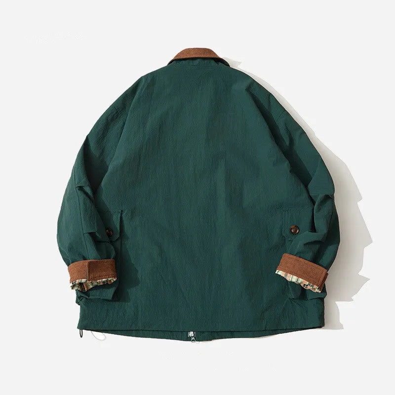 Casual jacket with contrasting colour panels and side seam pockets in polyester material