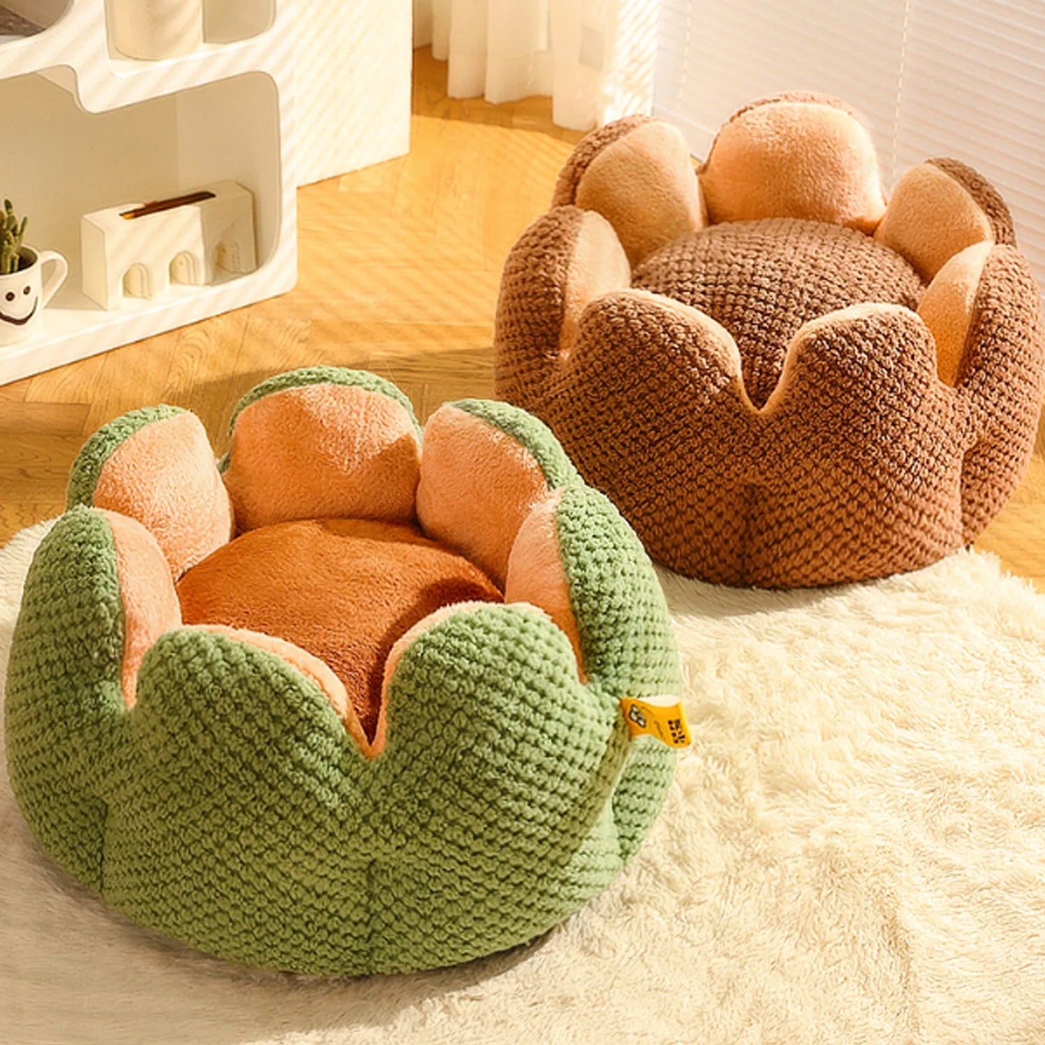 Green cactus-shaped enclosed pet kennel with soft plush interior, shown on a hardwood floor.