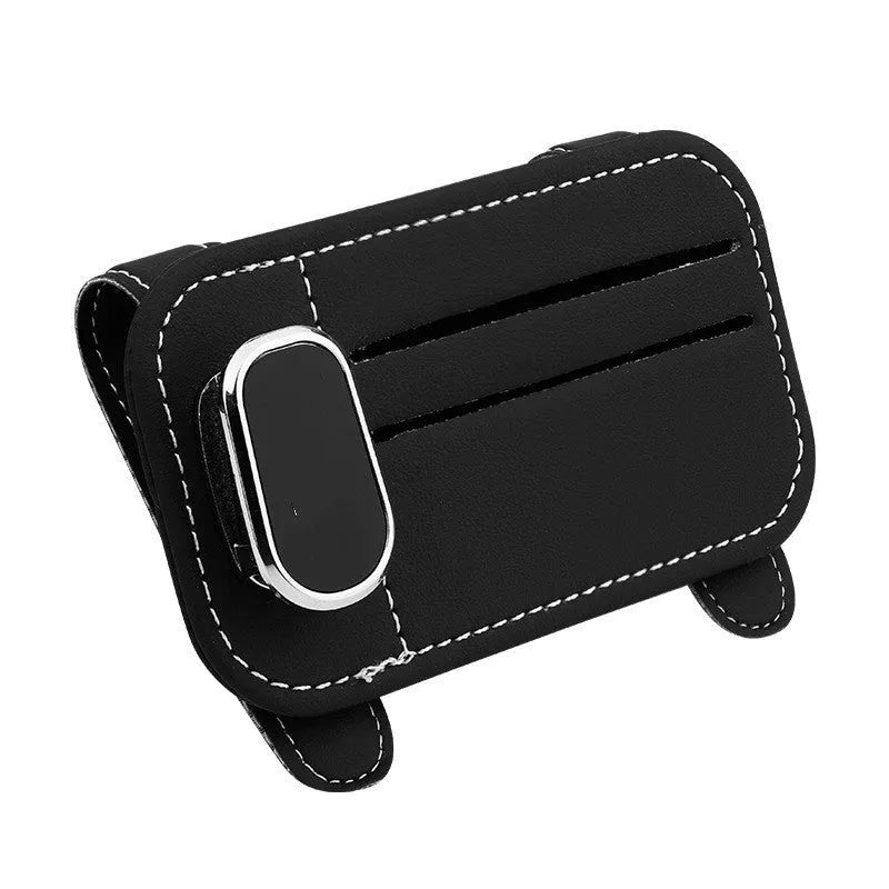 Beige first-layer cowhide leather card holder snapped onto a car's sun louver.