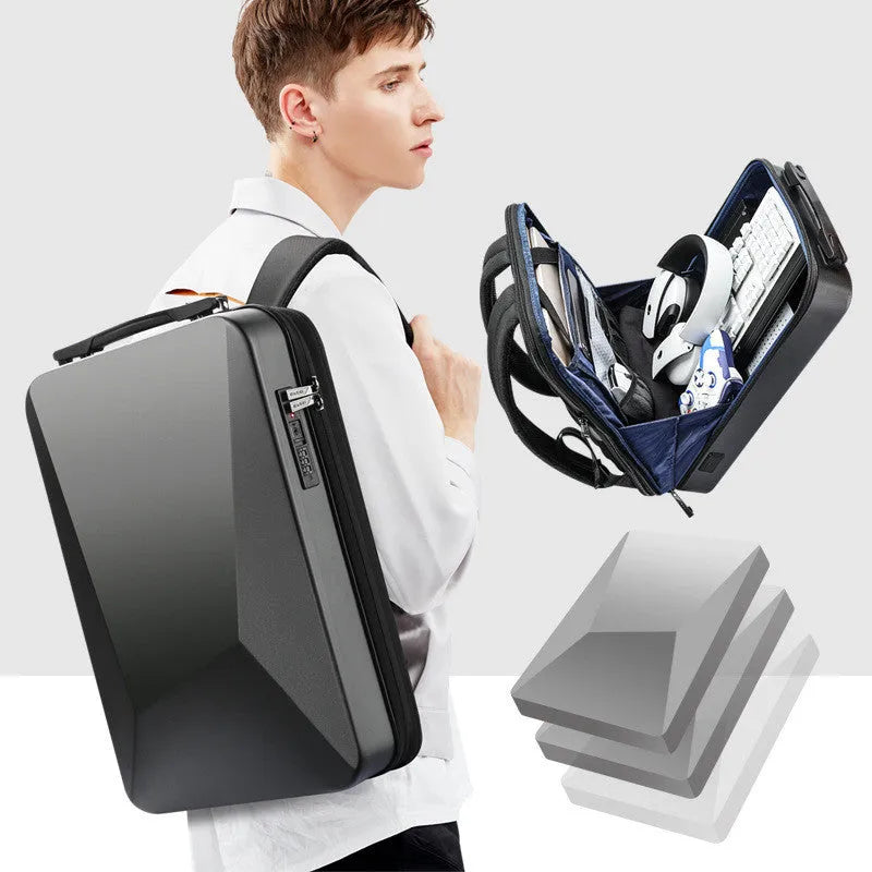Large PC hard shell gaming backpack showing titanium gold colour with locking mechanism and organised internal compartments