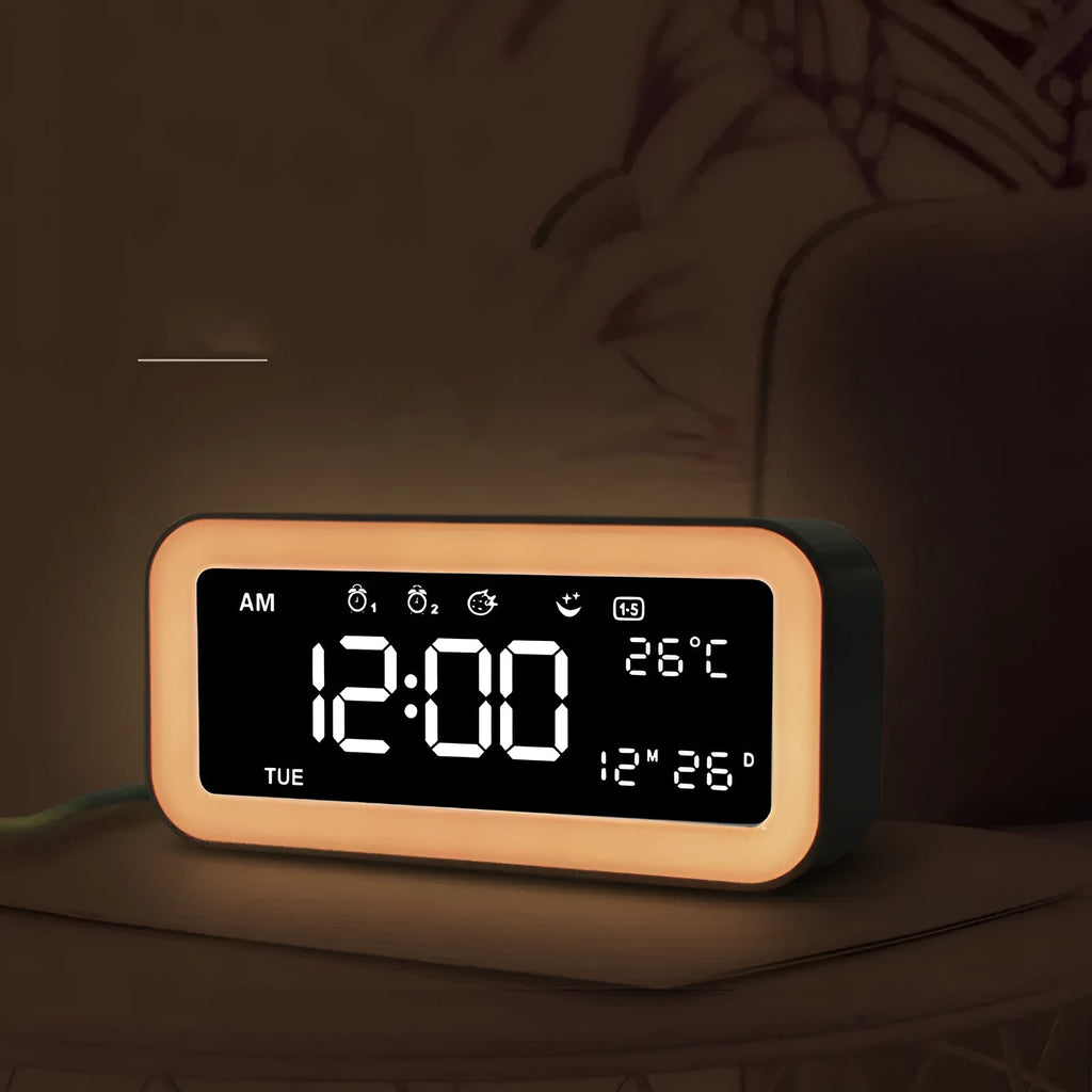 Blue rectangular LED atmosphere light alarm clock with digital display on bedside table