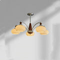 Middle Ancient style persimmon glass chandelier with chrome arms and milky white glass lampshades.