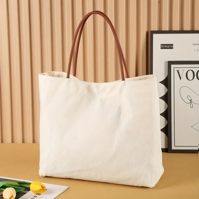 Heavyweight cotton canvas tote bag in beige white and white colour options.