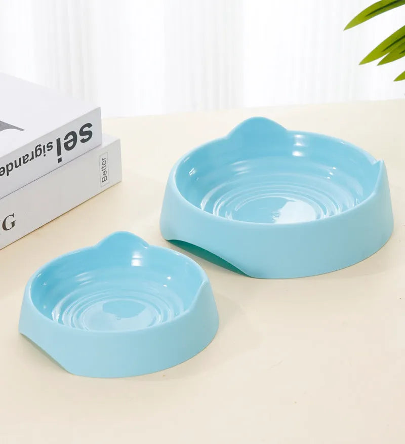 Blue ceramic dog slow feeder bowl with raised cup maze design for large breed dogs.