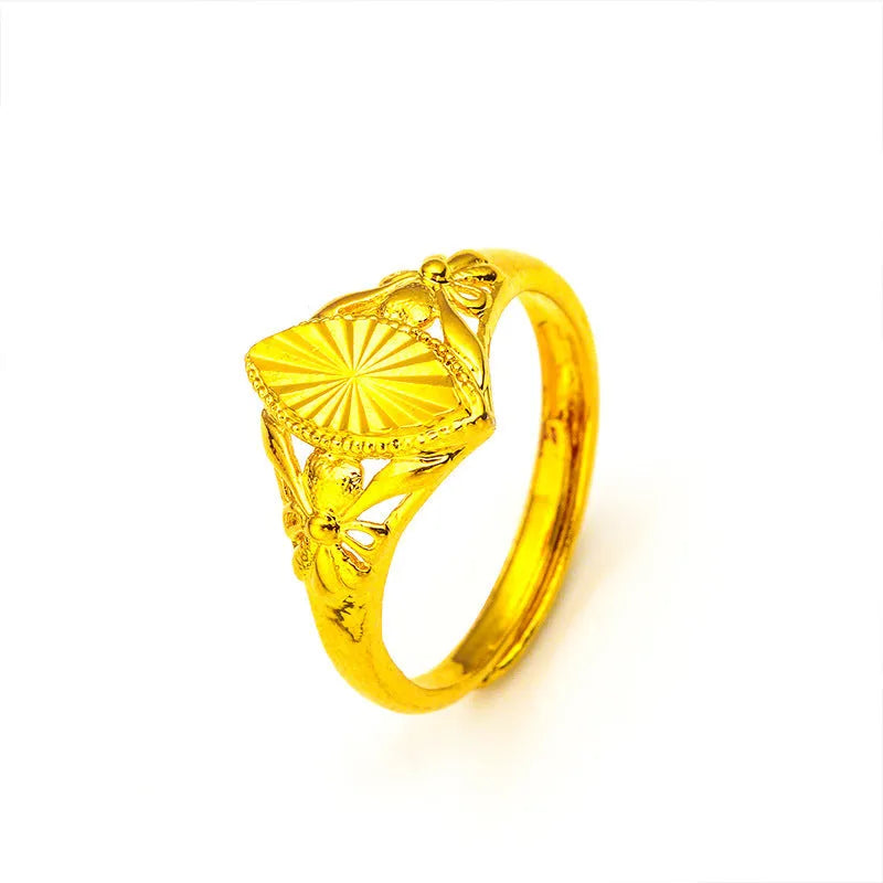 Gold geometric open flower ring with textured surfaces, brass construction with electroplating