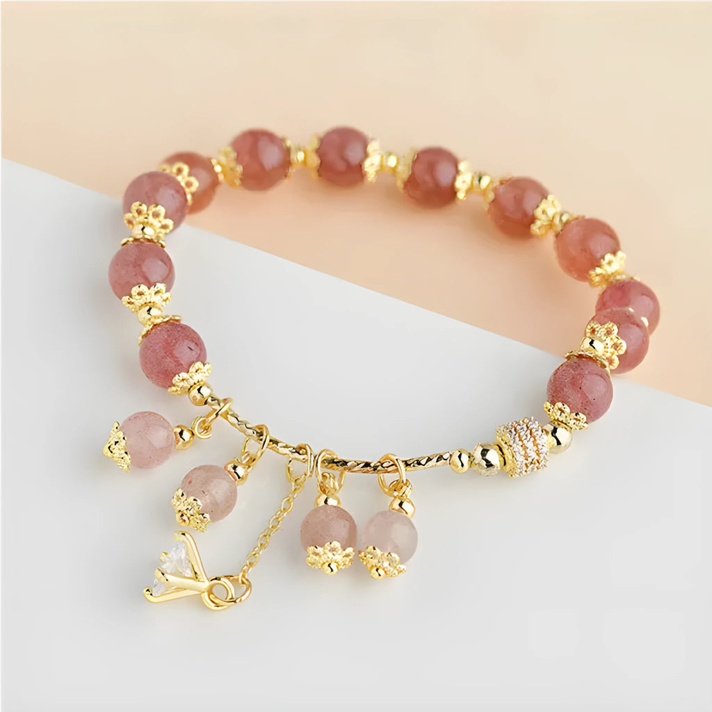 Pink strawberry quartz crystal bracelet with heart shape and pearl accents