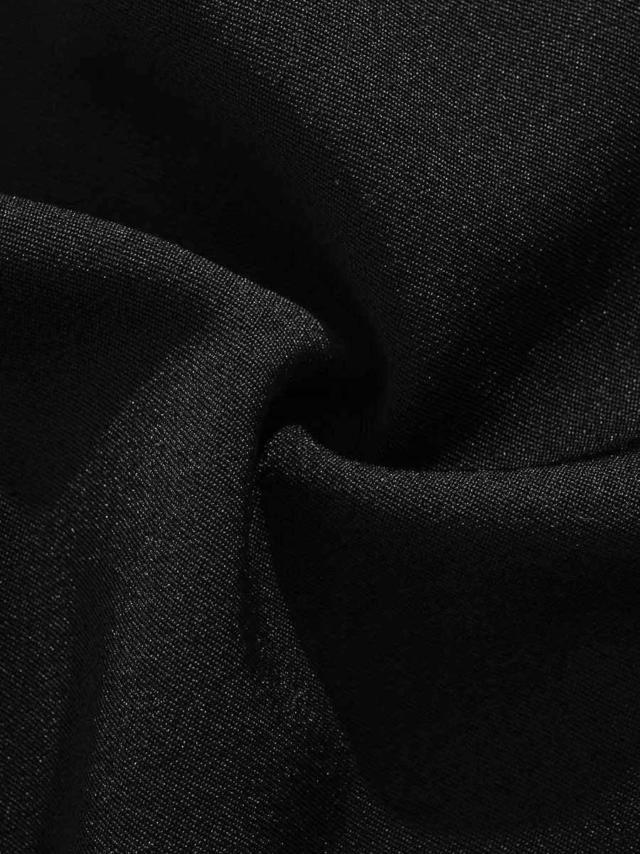 Men's black loose-fit shorts with semi-elastic waistband and colour button closure