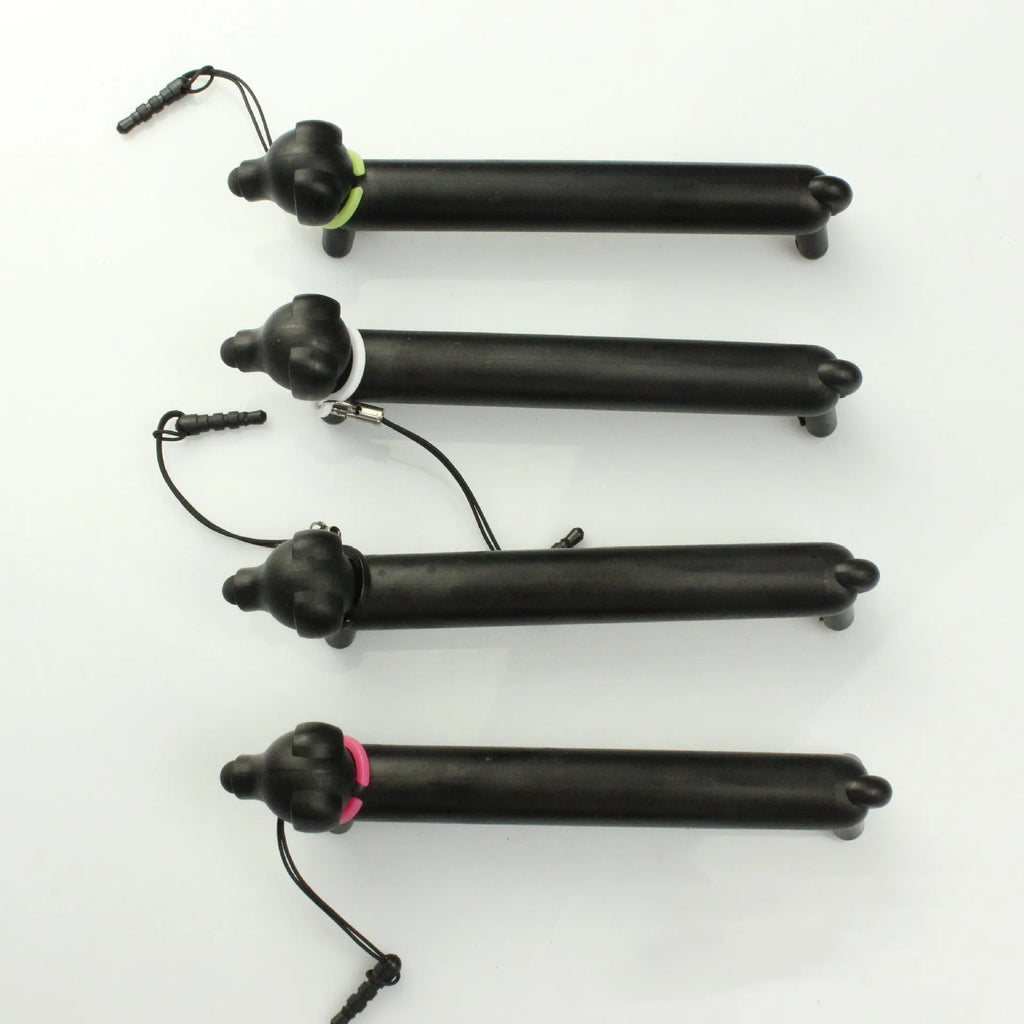 Black dog-shaped touch screen stylus with conductive construction shown next to its carry pouch