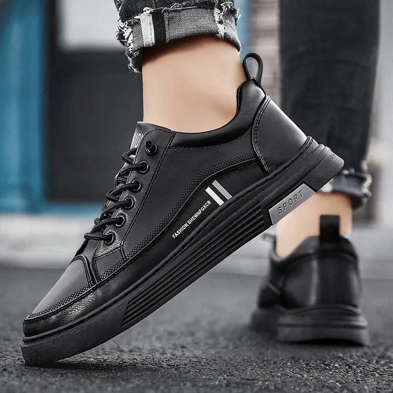 Men's low-top skateboard shoes with elastic band, microfiber upper, and rubber sole in black or white.