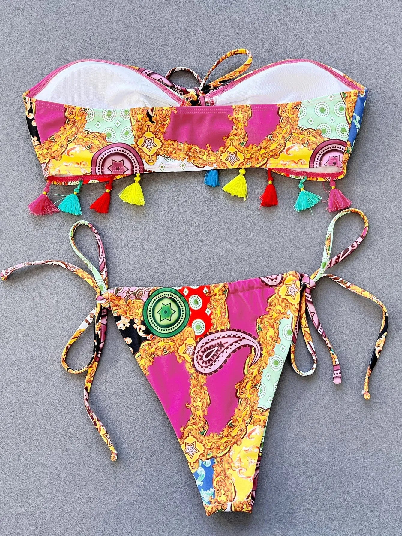 Women's printed separated swimwear bikini set with tube top and briefs.