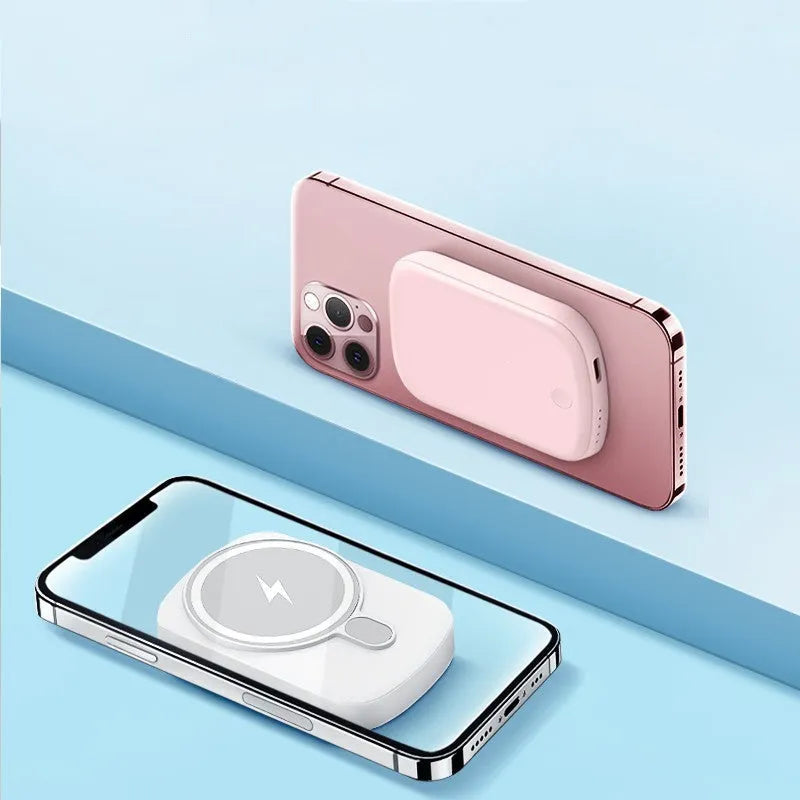Magsafe magnetic wireless power bank in four colours: black, purple, pink, and white, next to an iPhone.
