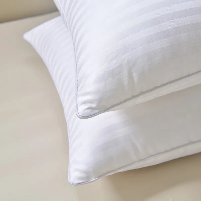 White cotton satin stripe pillow with feather cotton filler, shown in standard bedding size.