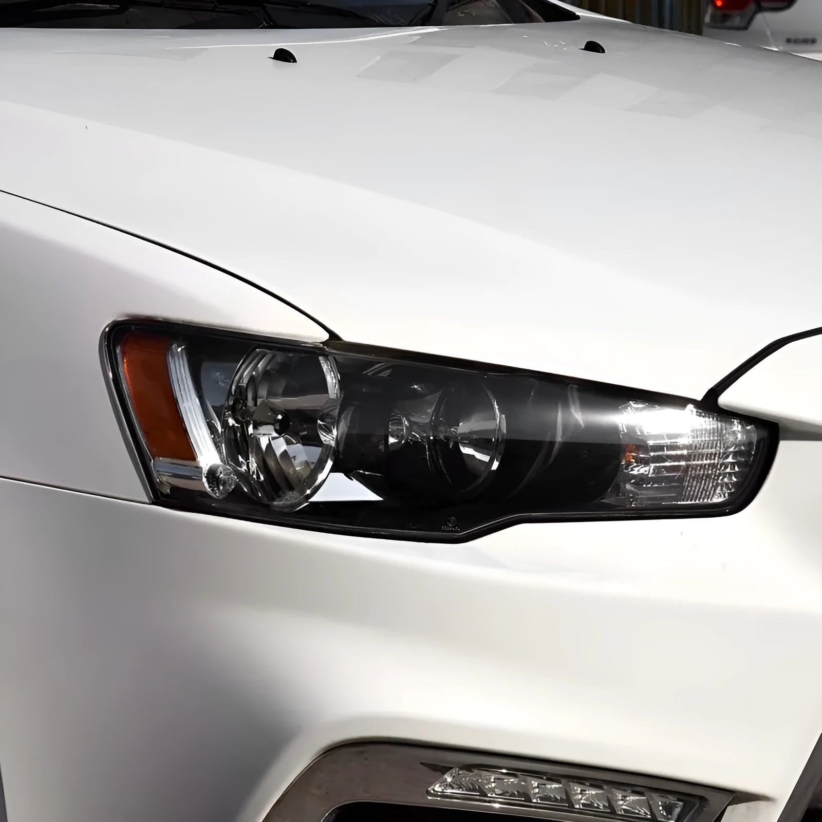 Transparent plastic headlight housing cover with 50mm x 30mm x 20mm dimensions