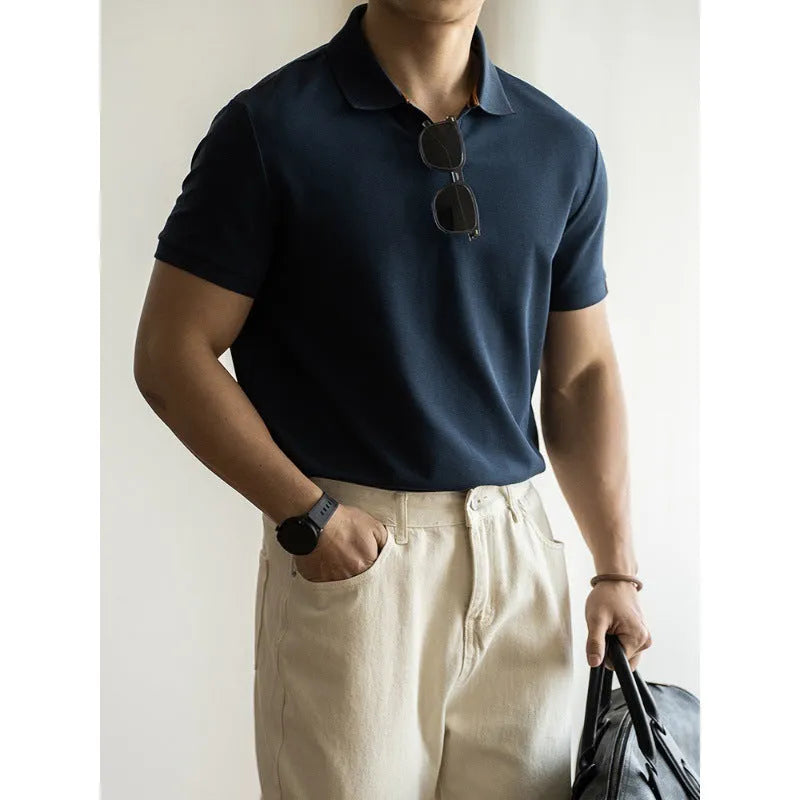 Men's short-sleeve cotton polyester polo shirt in blue, black and white colours showing regular fit design