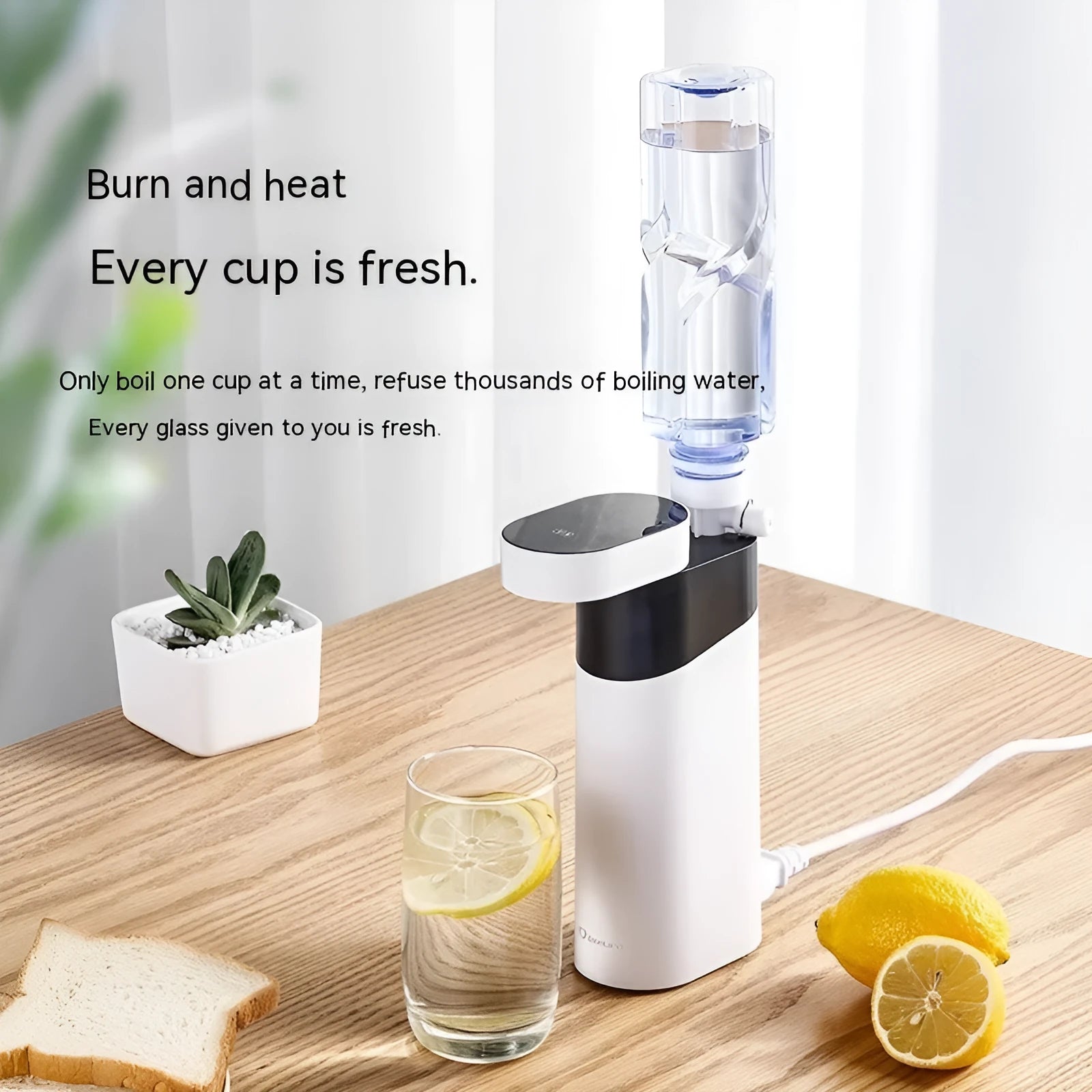 Small black or green desktop instant water dispenser with digital temperature display.