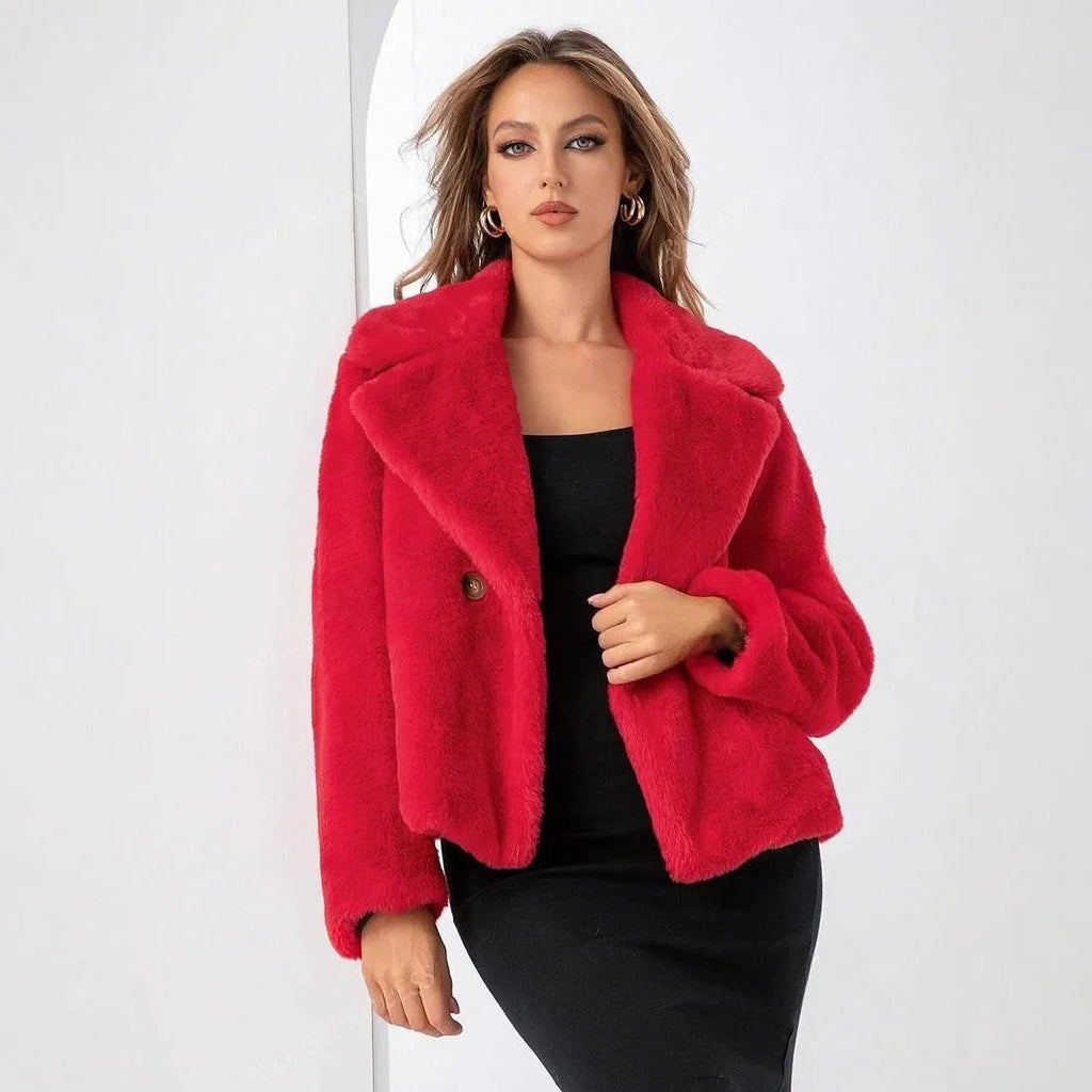 Women's short loose faux fur coat in rose red colour with regular sleeves.